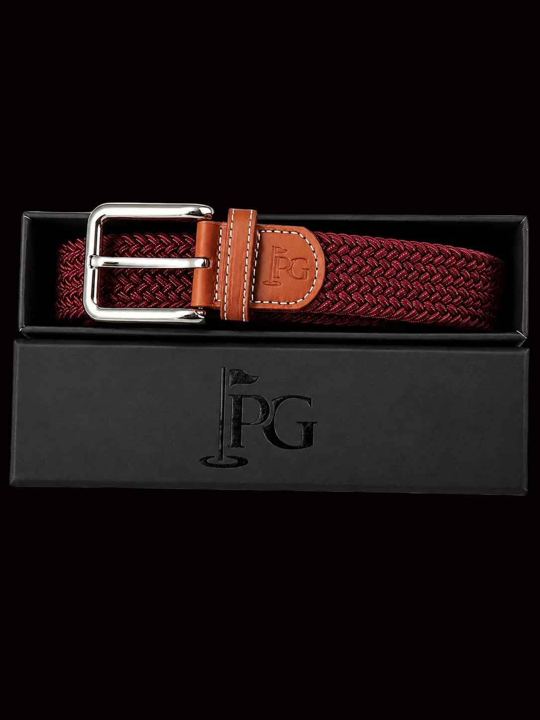 ABurgundy PG brand woven belt, brown leather accents, and a silver buckle